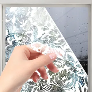 Static cling window film with delicate white lace stone pattern for home privacy decoration.