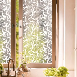 Detailed view of floral lace static window film, offering privacy and elegant home decor.