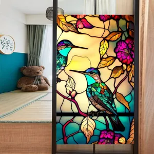 Detailed scene of stained glass window film featuring retro hummingbirds and floral design.