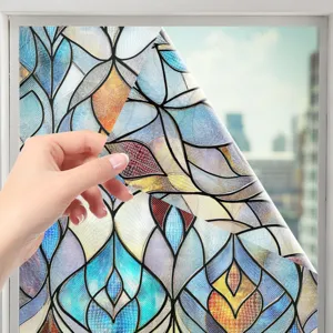 Close-up detail of 3D embossed stained glass window film being peeled, static cling sticker.