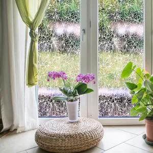 Detailed view of white lace floral window glass film, perfect for home privacy and decor.