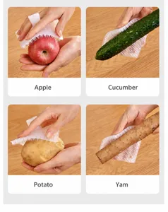 Flexible silicone finger cleaning brush detail demonstrating easy washing of fresh fruits and vegetables.