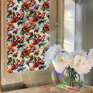 Detailed view of the colorful stained glass window film featuring turtle and floral patterns.