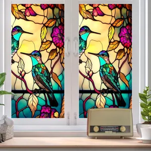 Stained glass window film featuring vintage hummingbirds and floral patterns, static cling.
