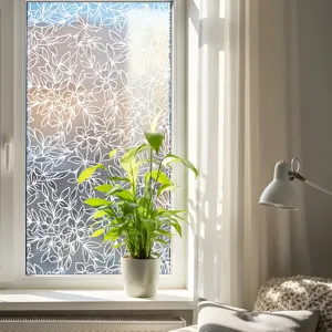 Decorative static cling window film with elegant floral lace pattern for glass privacy.