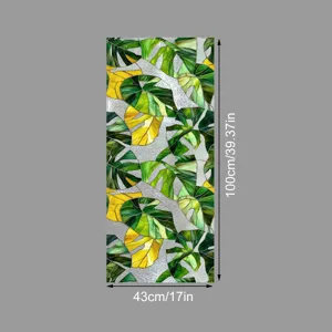 Film pour vitre décoratif avec motif de feuilles de monstera colorées et effet adhésif statique.
