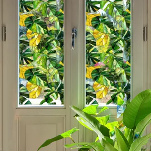 Film pour fenêtre statique décoratif avec motif de feuilles de monstera vitrail.