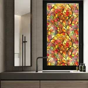 Film pour vitrage en verre teinté décoratif motif feuilles d'automne pour intimité et déco.