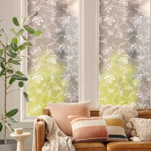 Decorative static window film with delicate lace floral pattern for home and office glass.