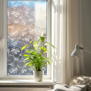 Detailed view of white floral lace static window film, offering privacy and elegant decor.