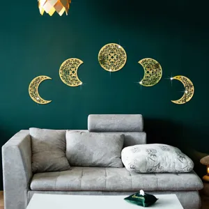 Modern gold acrylic moon phase wall stickers for elegant living room home decor styling.