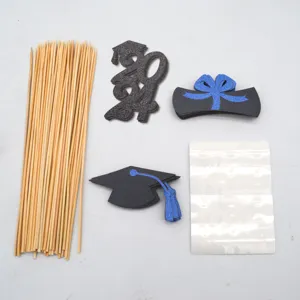 Graduation season DIY cake topper set with wooden sticks and glitter 2024 cap card decor.
