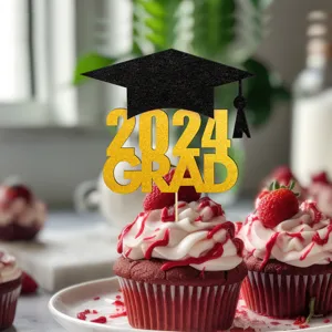 Close-up of 2024 graduation cake topper on delicious cupcake with strawberries party decor.