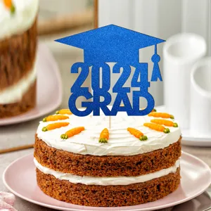 Blue glitter 2024 GRAD cake topper closeup, perfect graduation party dessert decoration.