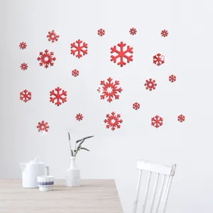 Adesivo murale specchio fiocco di neve in acrilico rosso per decorazioni natalizie.