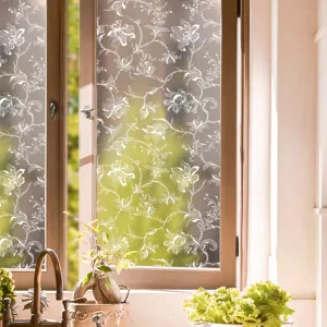 Detailed view of the static cling window sticker featuring an elegant white floral lace design.