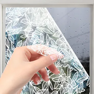 Static cling window film with elegant white lace floral pattern for home decor privacy detail view.
