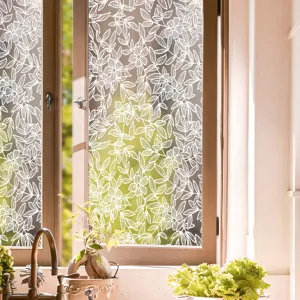 Detailed view of white lace window glass sticker, electrostatic film for home decor and privacy.