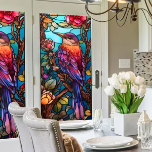Film pour vitrage coloré avec motif d'oiseau et de fleurs pour une belle décoration.
