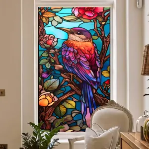 Vue détaillée du film pour fenêtre en verre coloré avec un superbe motif d'oiseau et de fleurs.