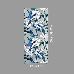 Film pour vitre en verre teinté décoratif avec motif floral d'oiseau bleu et rose blanche.