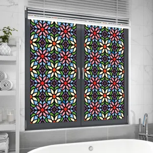 Detail view of colorful retro stained glass window film applied in a clean bathroom scene.