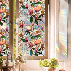 Decorative window film with floral magnolia stained glass design creating rainbow light effects.