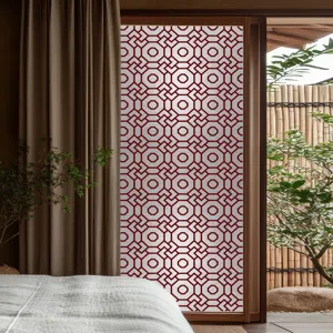 Vue détail film pour vitre géométrique rouge, adhésif électrostatique intimité décoration.
