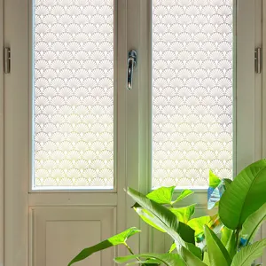 Decorative window film with shell lace pattern for privacy and glass protection in home interior.