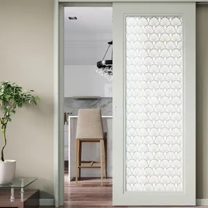 Decorative static window film with elegant fan pattern for privacy and glass door decor.