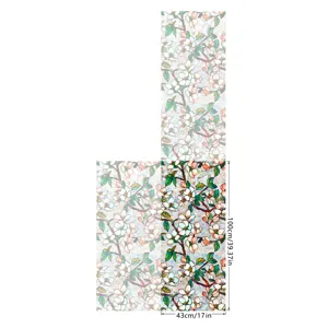 Detailed view of the colorful static cling window film featuring a floral stained glass pattern.