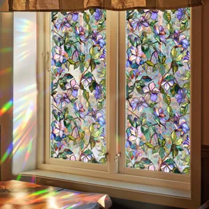 Detailed view of decorative stained glass window film with vibrant floral patterns and light.