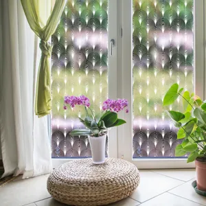 Static window glass film detail view featuring decorative green purple lace pattern design.
