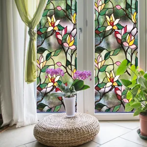 Film pour vitre en verre teinté décoratif avec motifs floraux et d'oiseaux pour l'intimité.