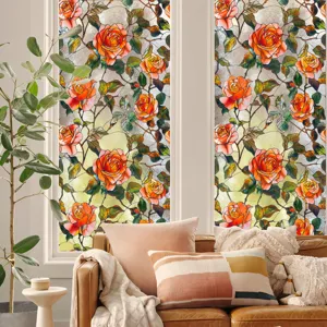Film pour fenêtre décoratif avec motif de roses orange et de vignes pour vitrage.