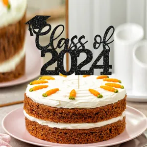 Detailed view of the black glitter Class of 2024 graduation cake topper on carrot cake.