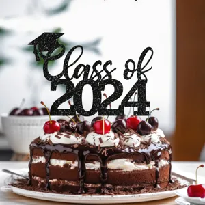 Black glitter Class of 2024 graduation cake topper detail shot on delicious chocolate cake.