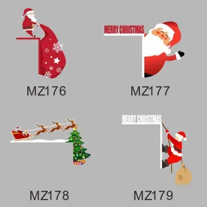 Close up details of Christmas wooden door corner stickers featuring festive Santa and tree designs.