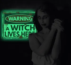 Glow in the dark Halloween witch warning wall sticker detail showing luminous green sign.