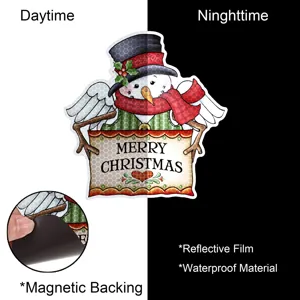 Detail view of Christmas magnetic snowman sticker showing reflective film and backing.