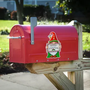 Christmas gnome magnetic sticker detail showing festive garage door decoration in outdoor scene.
