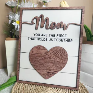 Detailed closeup of the wooden Mother's Day puzzle plaque decor with warm family text and heart.