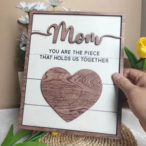 Wooden Mother's Day plaque with heart puzzle design and warm family quote for home desk decor.