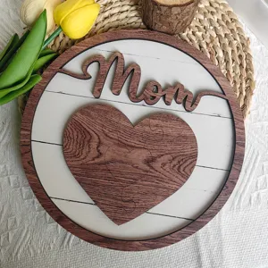 Close-up detail of wooden Mom plaque with heart puzzle and tulips, ideal Mother gift decor.