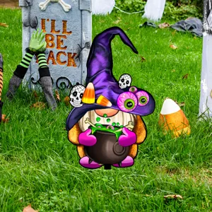Detalle de estaca de jardín de bruja de Halloween con diseño de caldero divertido césped.