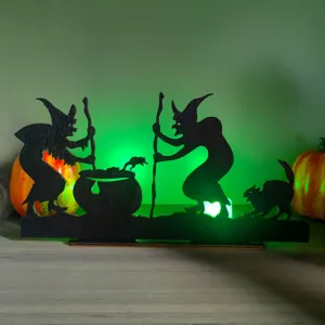 Halloween wooden tabletop decor detail, witch silhouette design with green light effect