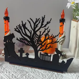 Halloween wooden tabletop lighted decor ornament with spooky graveyard silhouette design.