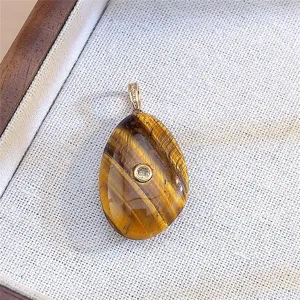 Pendente a goccia in pietra preziosa occhio di tigre naturale con gancio dorato chic.