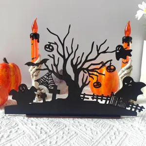 Halloween wooden tabletop decoration detail, spooky tree silhouette with ghosts and pumpkins.