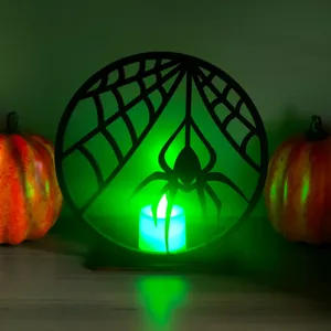 Dettaglio candela LED ragnatela Halloween, decorazione da tavola luminosa spettrale.